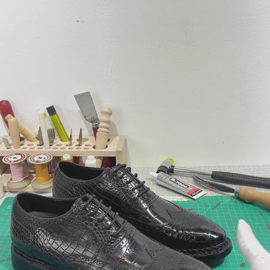 video demonstrating black genuine alligator leather brogue Oxford shoes