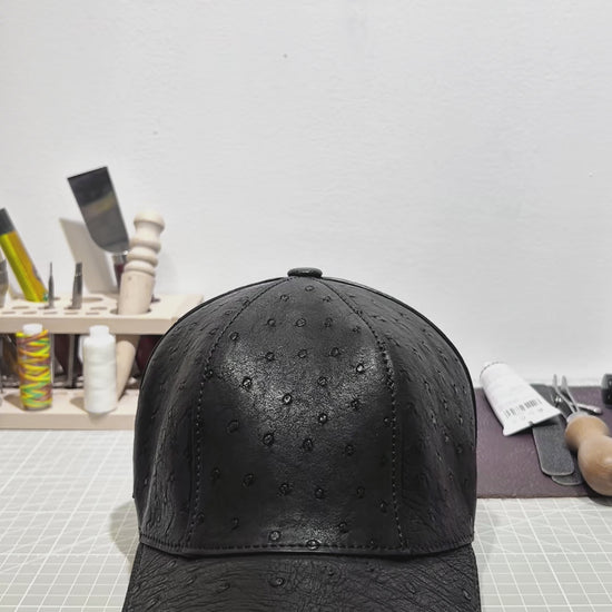 video demonstrating black genuine ostrich leather baseball cap