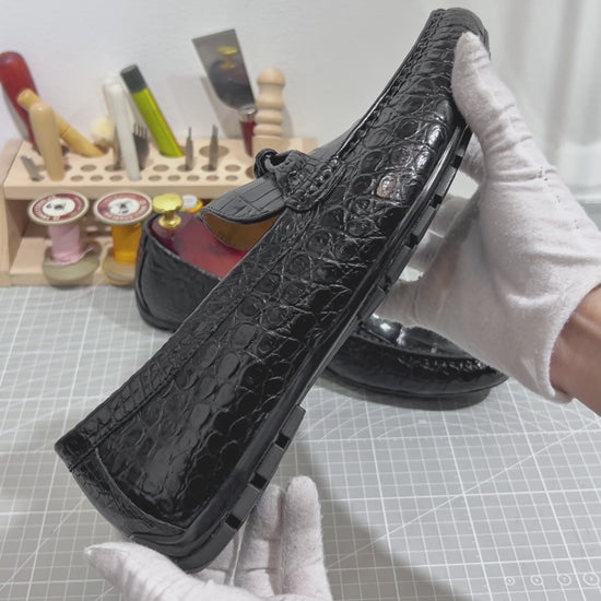 video demonstrating black genuine alligator belly leather knot loafers