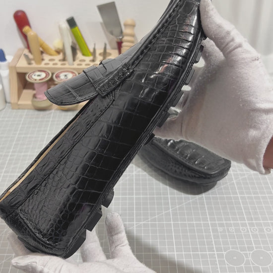 video demonstrating black genuine alligator belly leather penny loafers